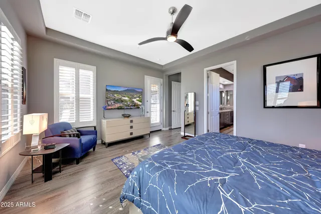 a large bathroom with a glass shower sink