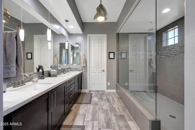 a bedroom with bed and window