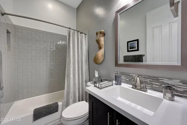 a view of a street with a lake view