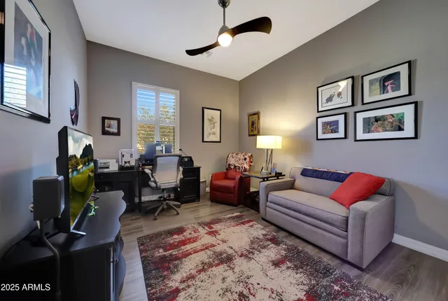 a view of a roof deck with couches and sky view