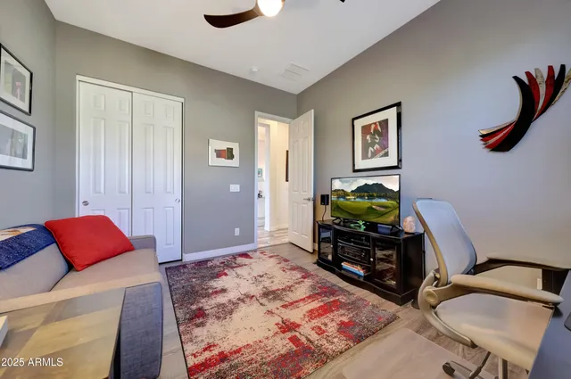 an aerial view of residential houses with outdoor space and river