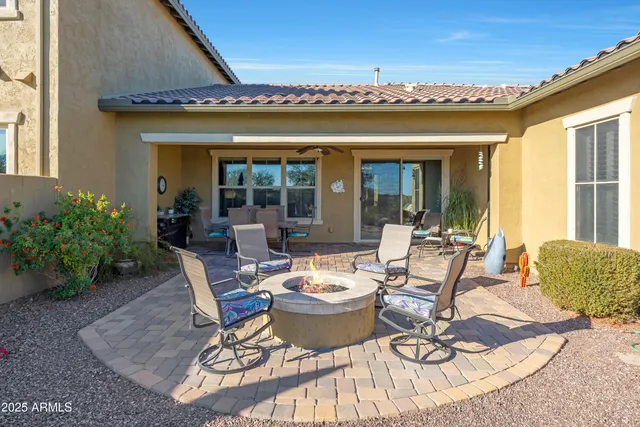 an aerial view of house with yard