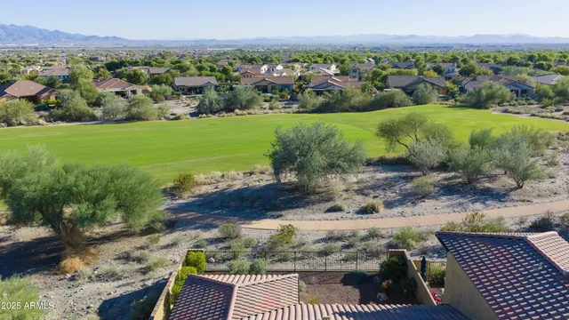 a front view of house with yard and outdoor seating