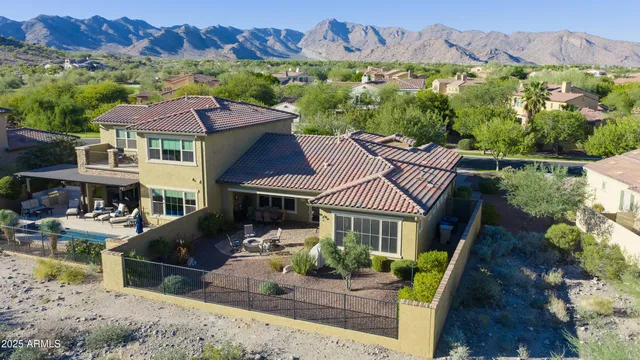 a view of a city with mountains in the background