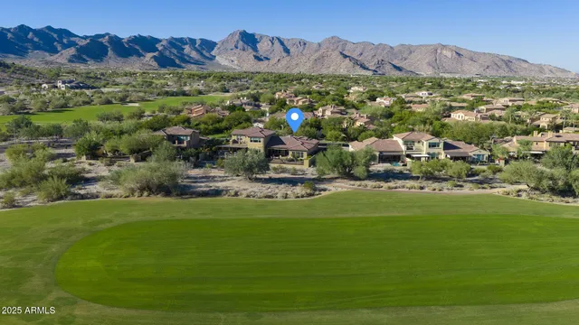 a view of a living room and dining room
