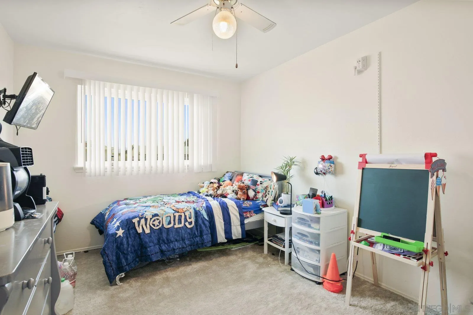 10442 Nate Way Santee, CA 92071 - Photo 19 of 31 a bedroom with bed and a window