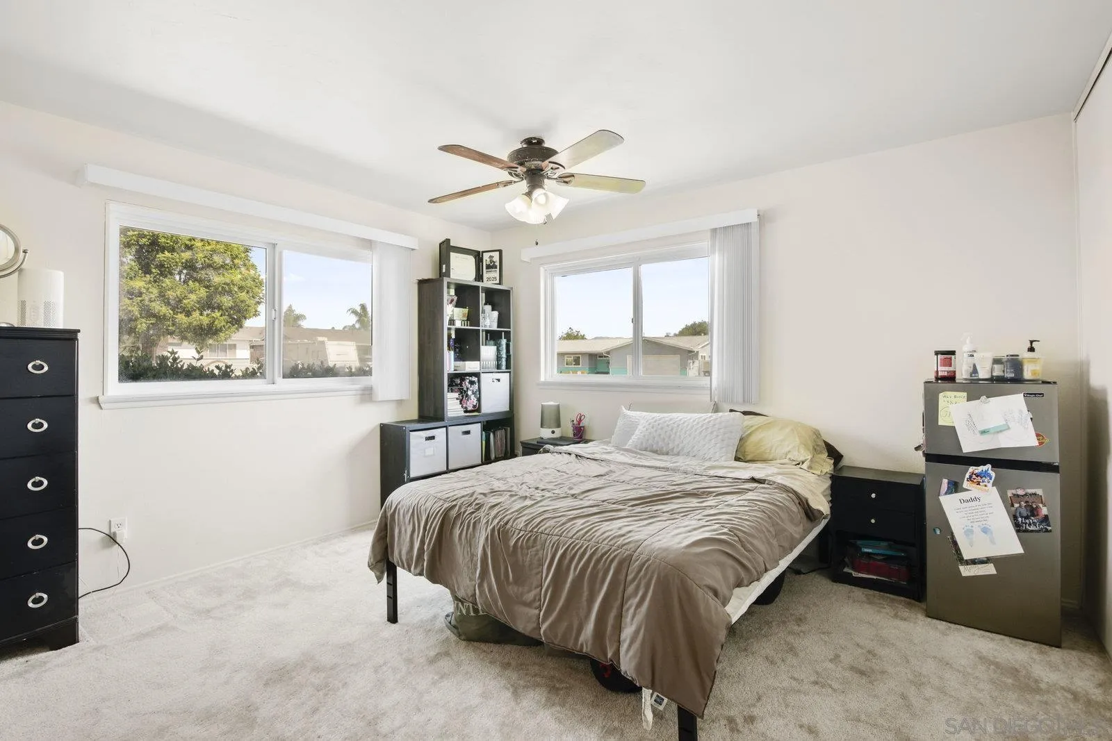 10442 Nate Way Santee, CA 92071 - Photo 20 of 31 a bedroom with a bed and a large window