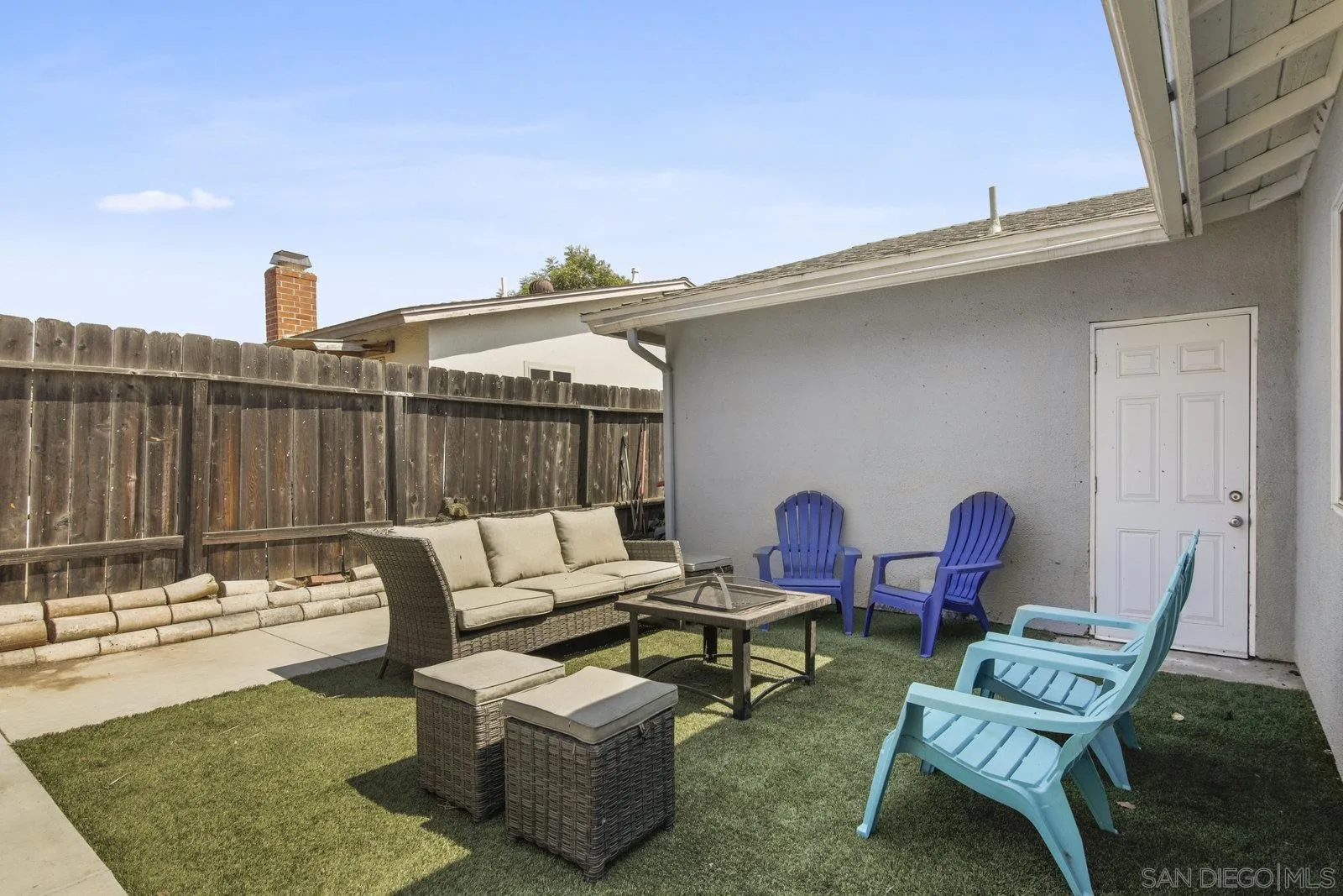 10442 Nate Way Santee, CA 92071 - Photo 22 of 31 a view of a patio with table and chairs with wooden floor