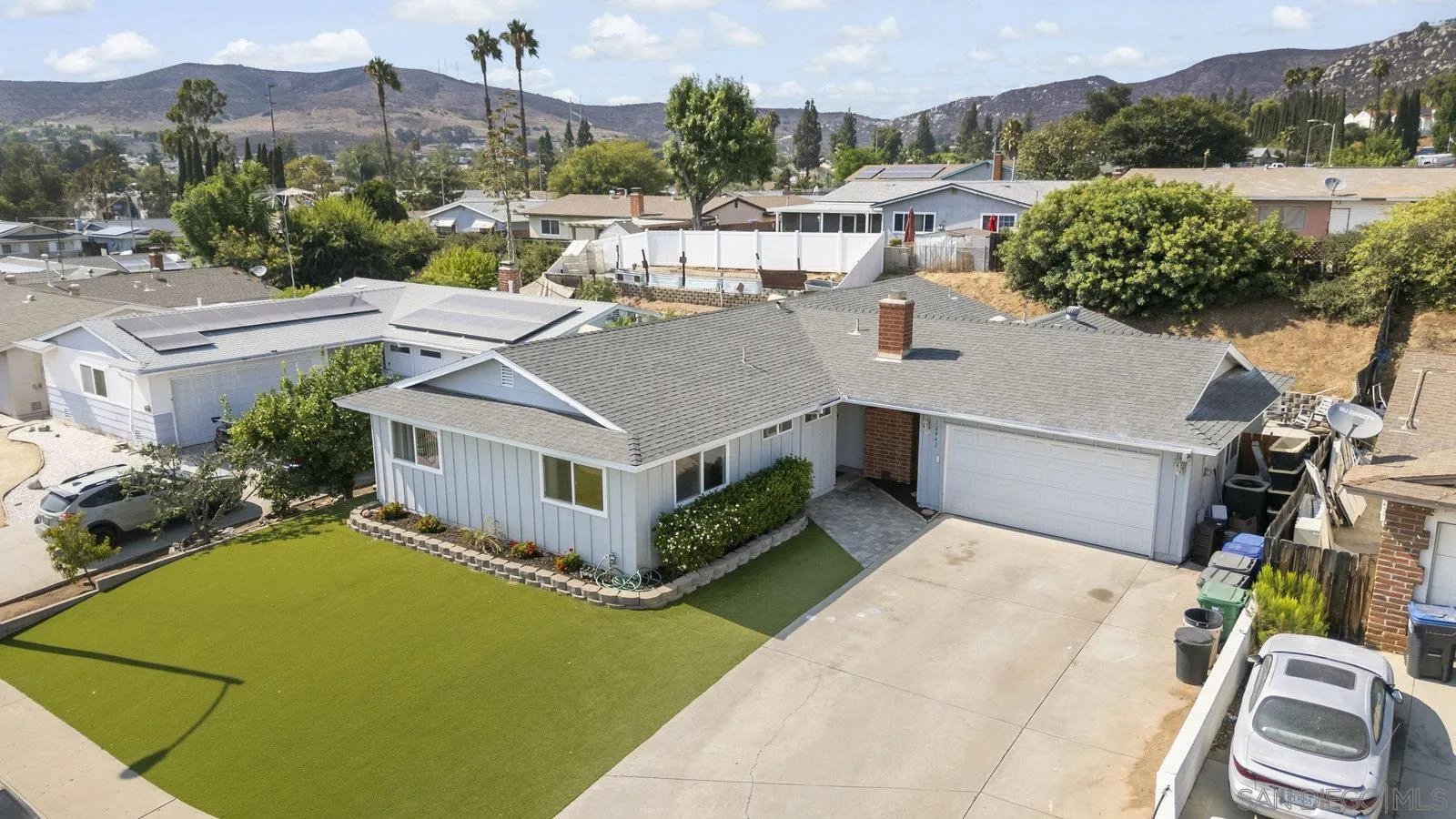 10442 Nate Way Santee, CA 92071 - Photo 28 of 31 an aerial view of a house with a garden and a building