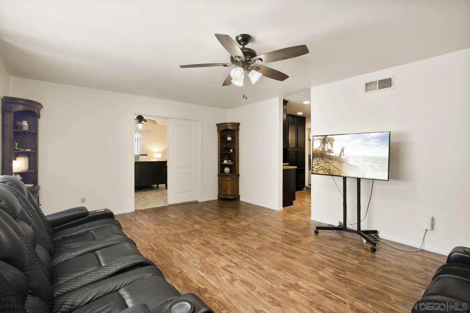 10442 Nate Way Santee, CA 92071 - Photo 7 of 31 a view of livingroom with hardwood floor and ceiling fan