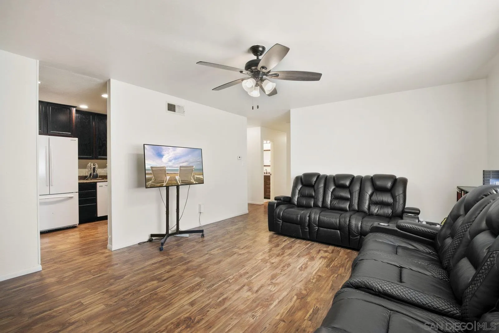 10442 Nate Way Santee, CA 92071 - Photo 8 of 31 a living room with furniture and a flat screen tv