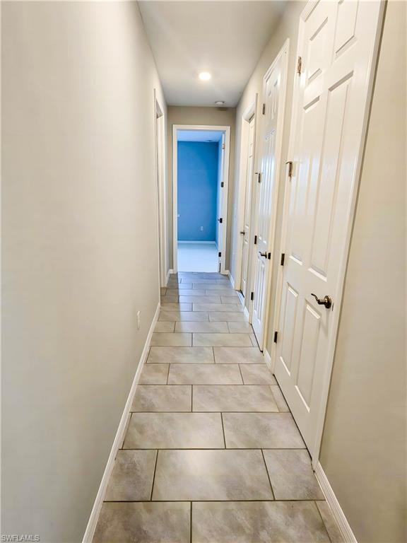 1264 Enbrook Loop Naples, FL 34114 - Photo 11 of 27 a view of a hallway