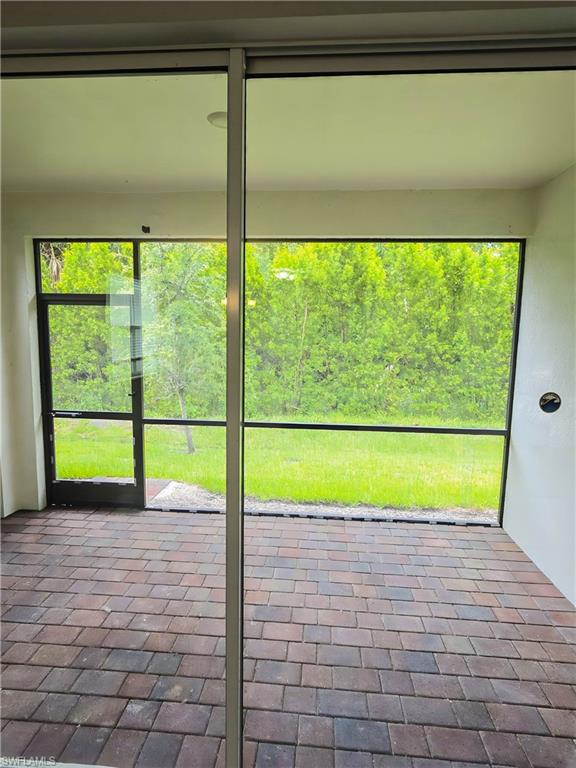 1264 Enbrook Loop Naples, FL 34114 - Photo 17 of 27 a view of empty room with window