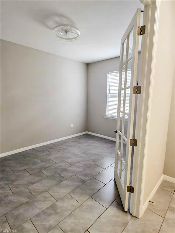 1264 Enbrook Loop Naples, FL 34114 - Photo 6 of 27 a view of an empty room