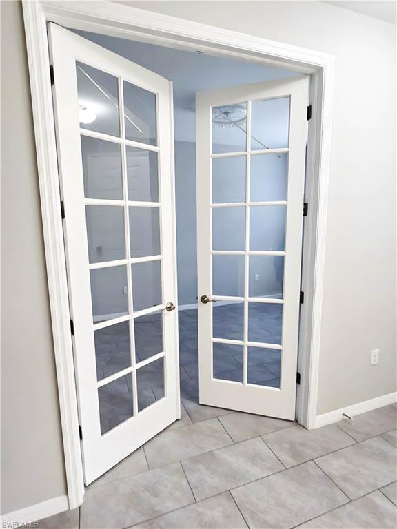 1264 Enbrook Loop Naples, FL 34114 - Photo 7 of 27 a view of an empty room with a empty space