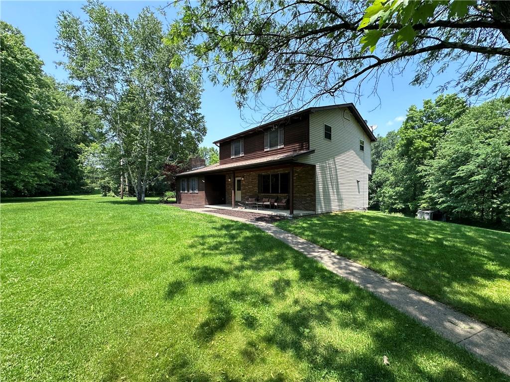 752 Covered Bridge Road Volant, PA 16156 - Photo 34 of 48 a front view of house with yard and green space