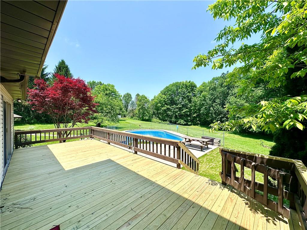 752 Covered Bridge Road Volant, PA 16156 - Photo 36 of 48 a view of a patio with wooden floor