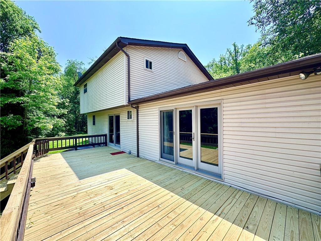 752 Covered Bridge Road Volant, PA 16156 - Photo 37 of 48 a front view of a house with a yard