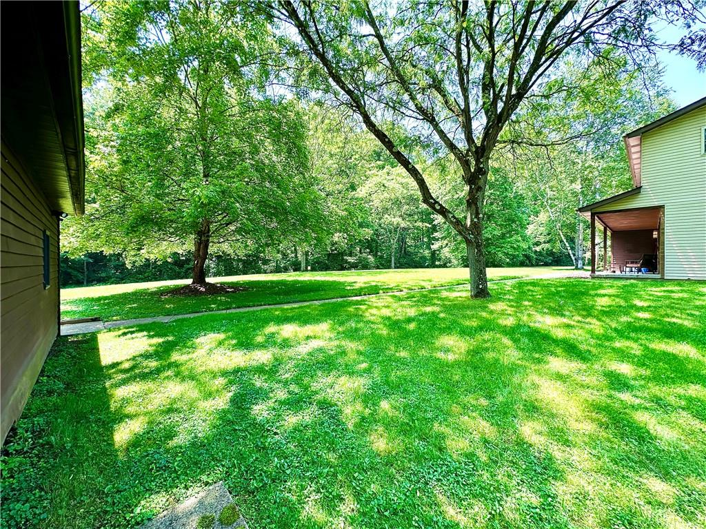 752 Covered Bridge Road Volant, PA 16156 - Photo 40 of 48 a view of a building with a yard
