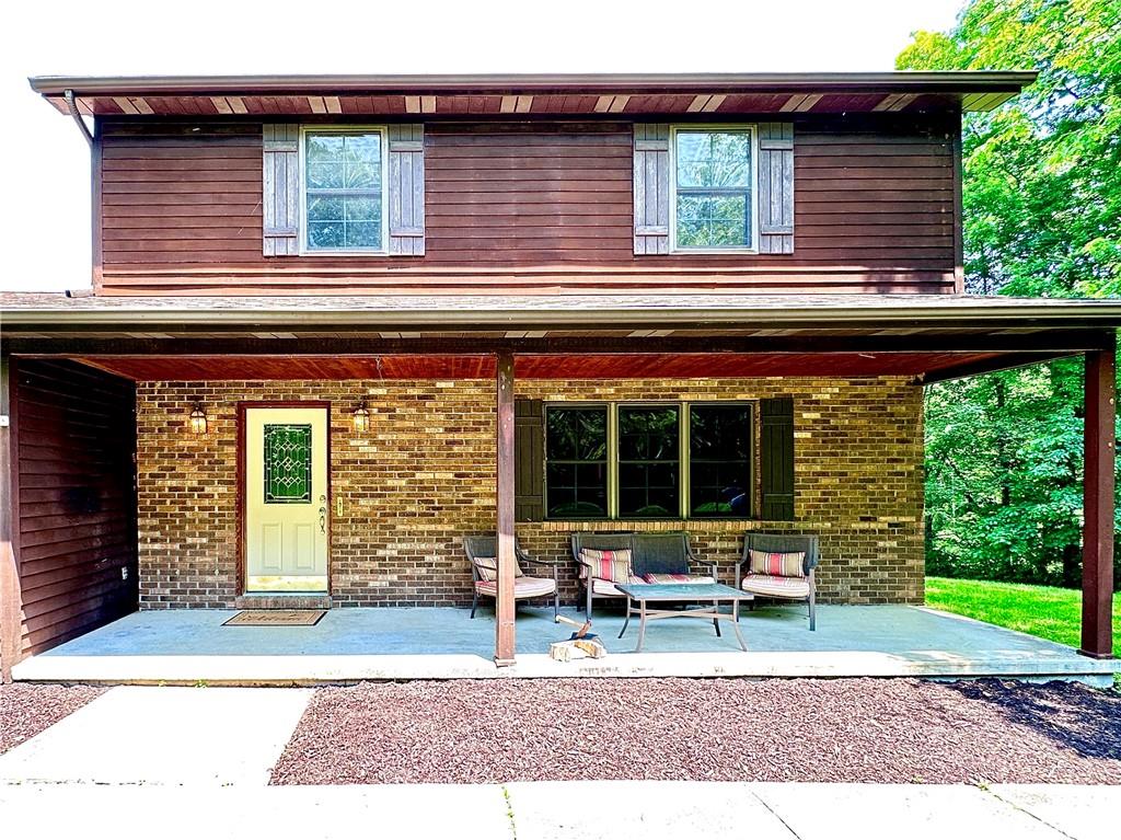 752 Covered Bridge Road Volant, PA 16156 - Photo 4 of 48 a house view with a sitting space