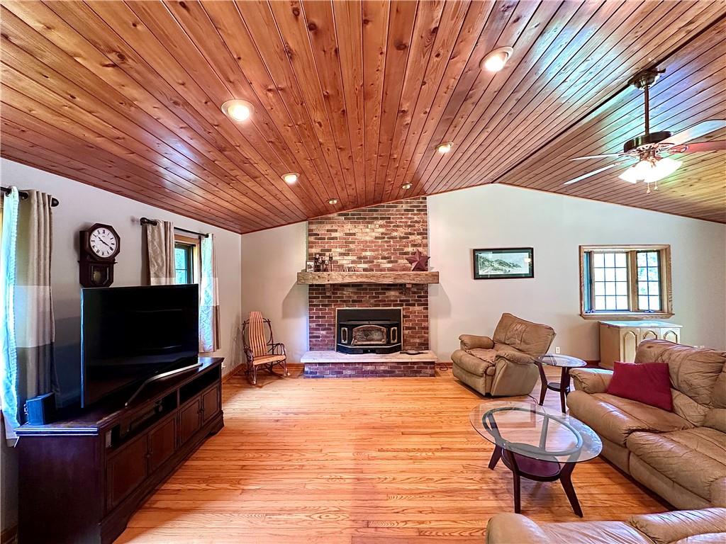 752 Covered Bridge Road Volant, PA 16156 - Photo 9 of 48 a living room with furniture and a flat screen tv