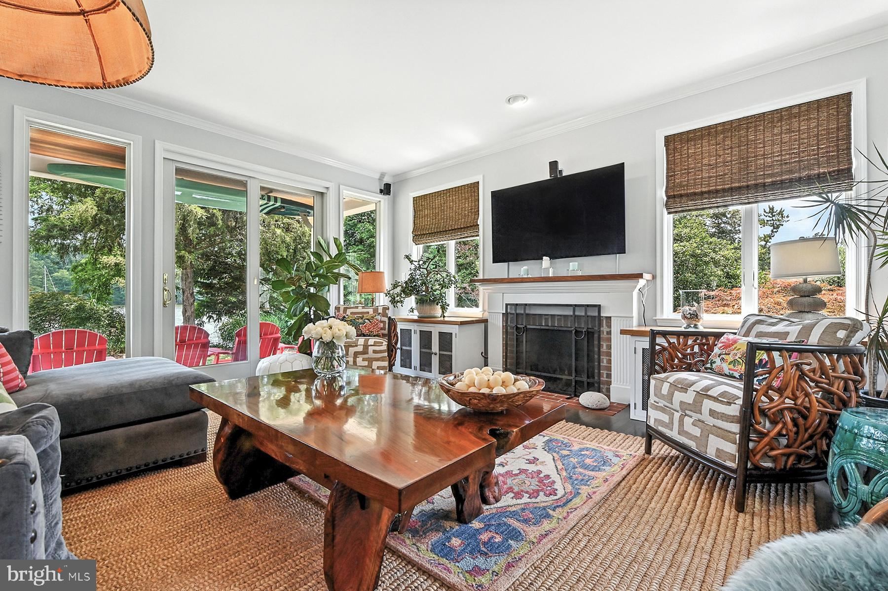 3307 Harness Creek Road Annapolis, MD 21403 - Photo 13 of 44 Wood-burning fireplace in the living room