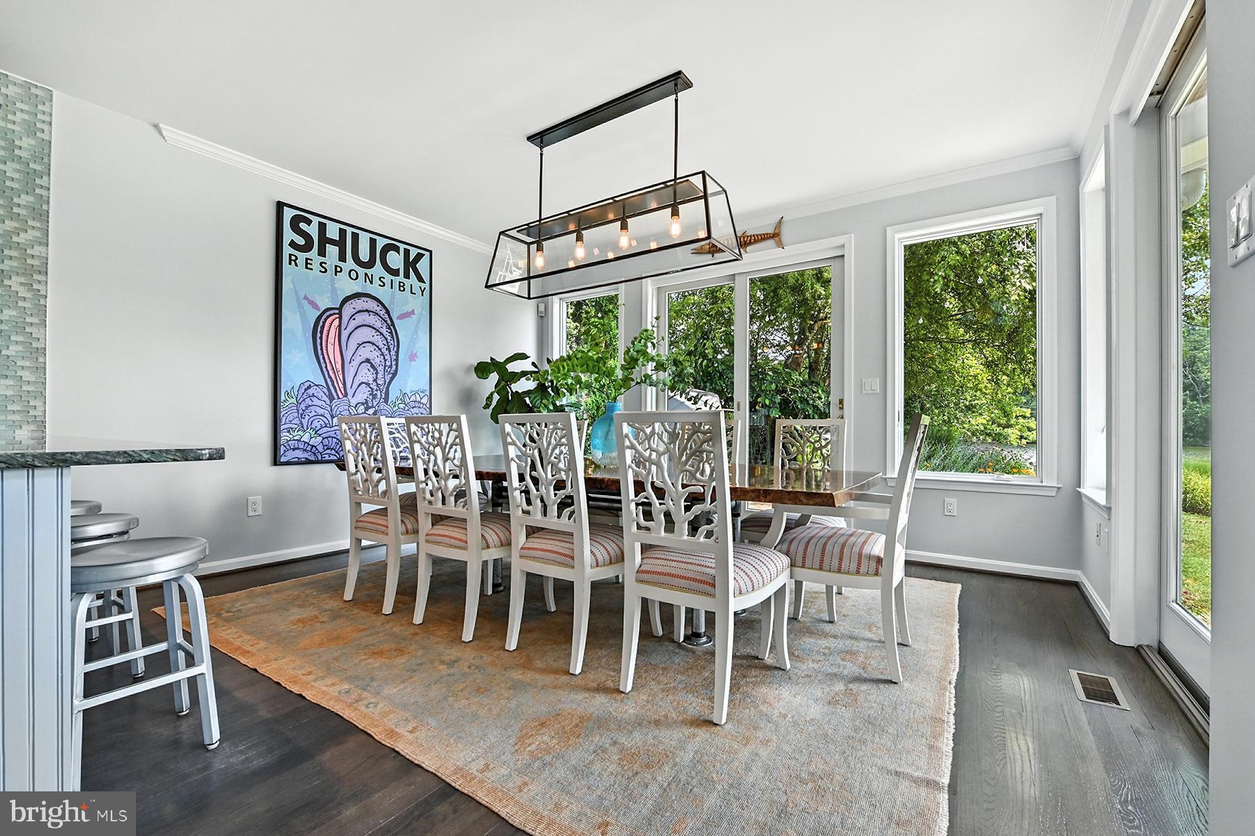 3307 Harness Creek Road Annapolis, MD 21403 - Photo 16 of 44 Dining room has two walls of glass for views