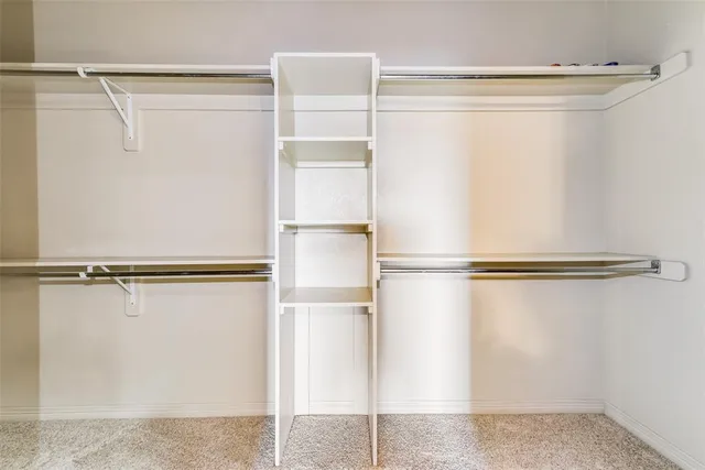 a view of a room with racks on the wall