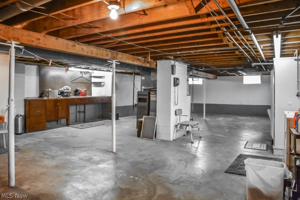 849 Pearlman Road Akron, OH 44319 - Photo 19 of 25 The full basement has a workshop area and ample storage space!