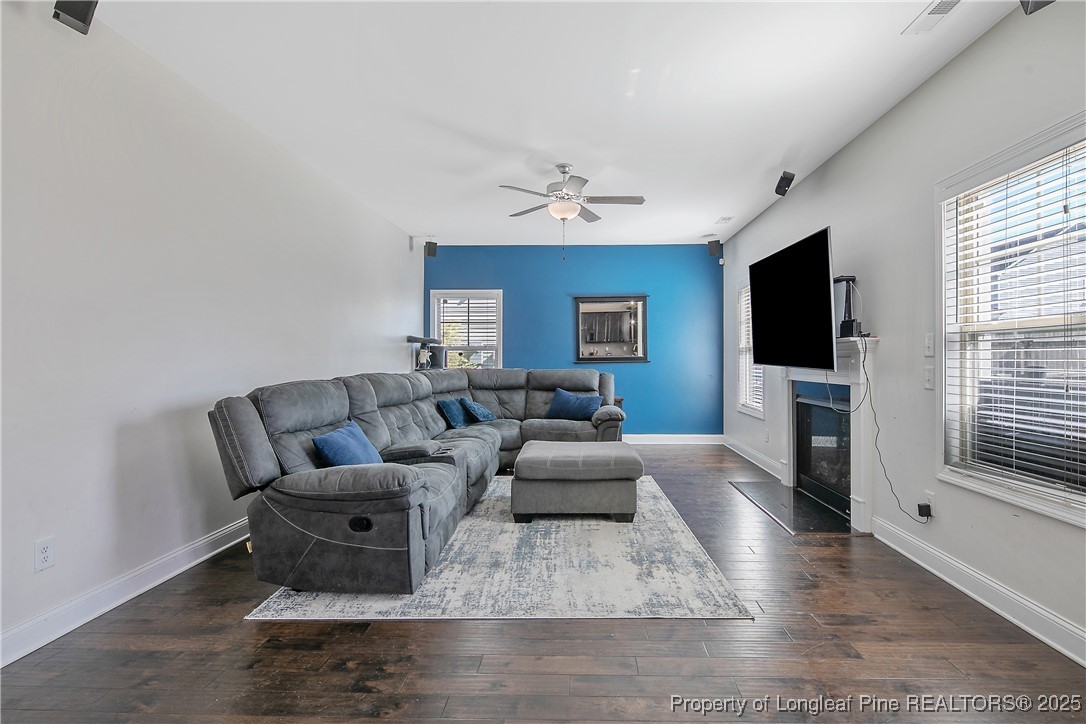 688 Stonebriar Avenue Raeford, NC 28376 - Photo 20 of 50 a living room with furniture and a flat screen tv