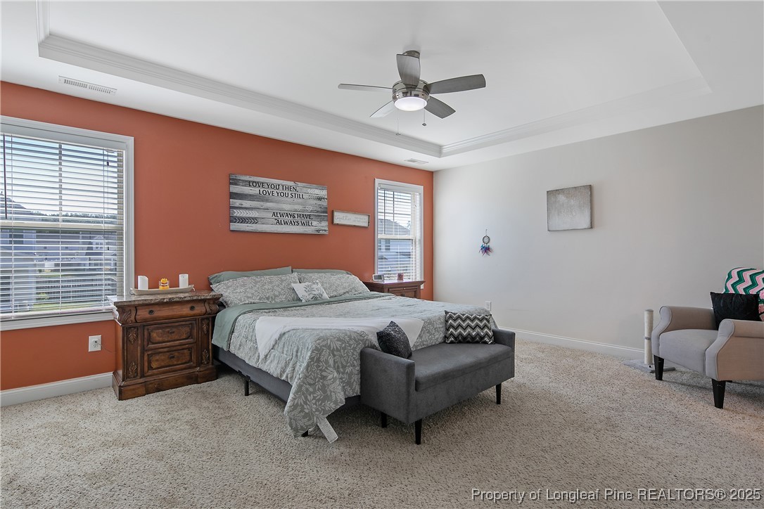 688 Stonebriar Avenue Raeford, NC 28376 - Photo 22 of 50 a spacious bedroom with a bed and a window