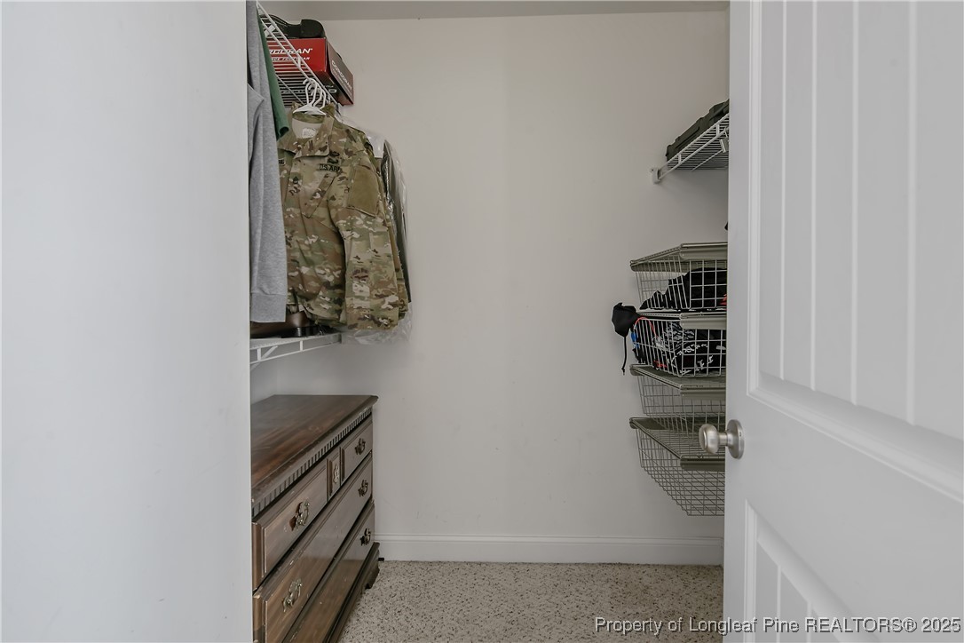 688 Stonebriar Avenue Raeford, NC 28376 - Photo 30 of 50 walk in closet with wooden floor