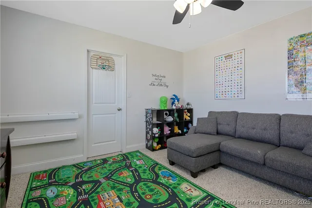 a living room with furniture and a couch