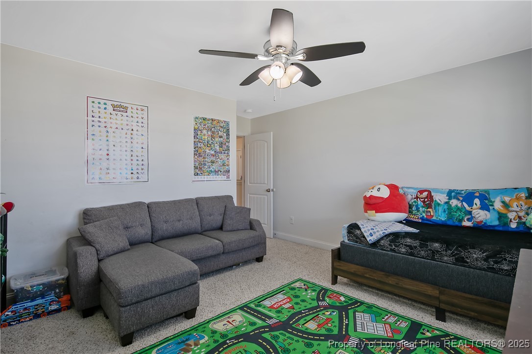 688 Stonebriar Avenue Raeford, NC 28376 - Photo 33 of 50 a living room with furniture