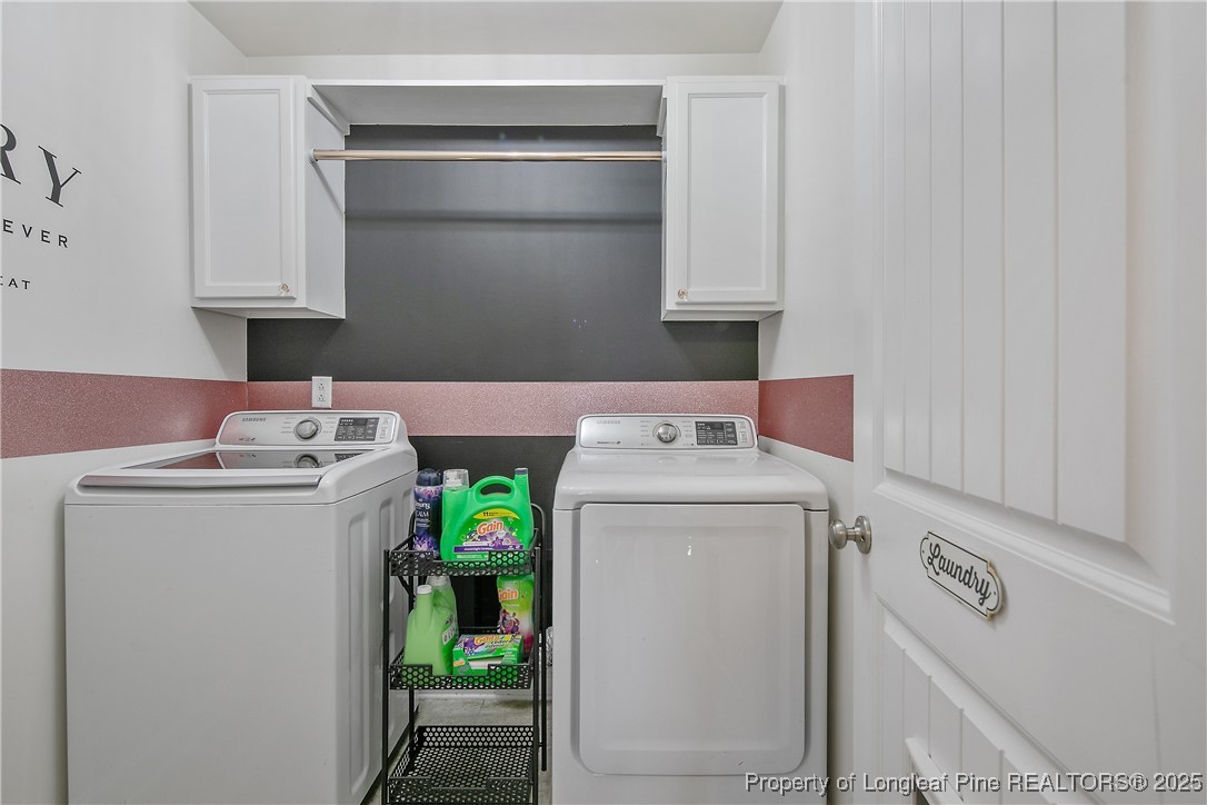 688 Stonebriar Avenue Raeford, NC 28376 - Photo 35 of 50 a utility room with dryer and washer