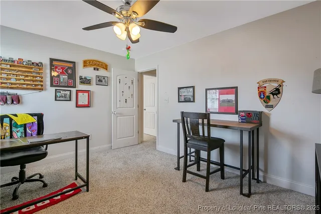 a view of a workspace with furniture