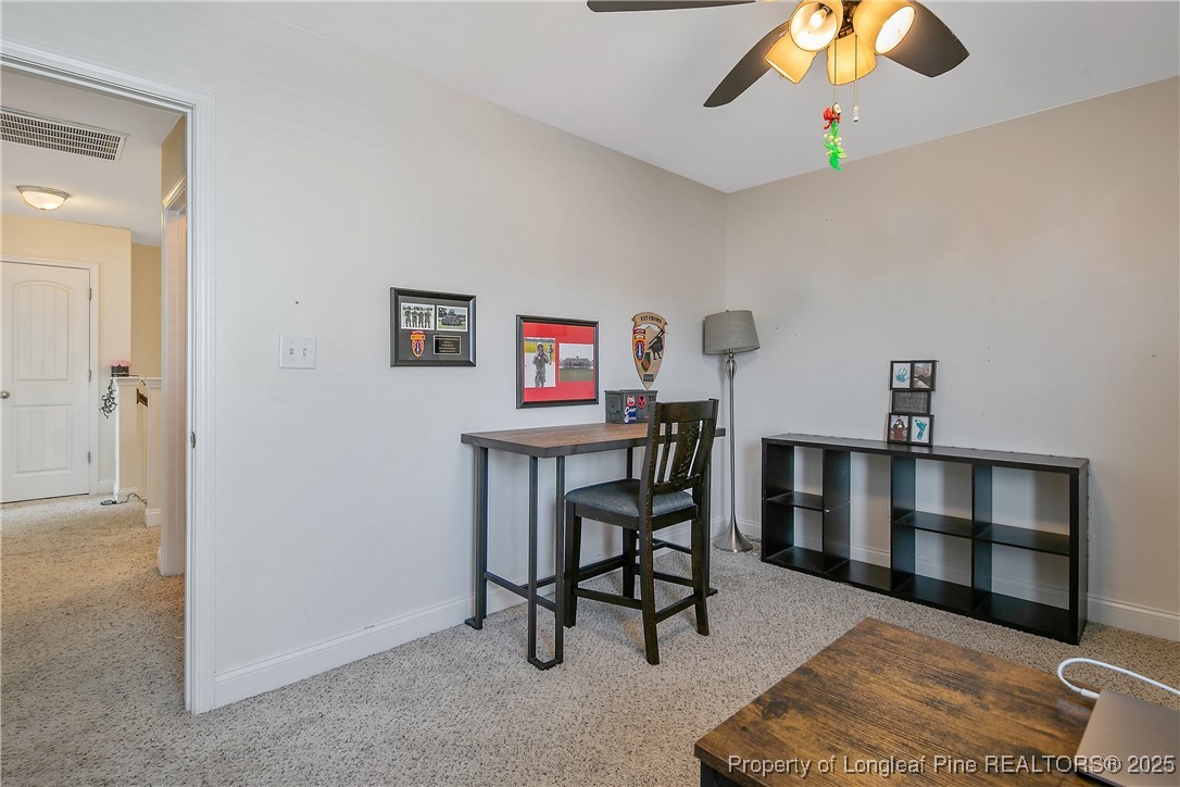 688 Stonebriar Avenue Raeford, NC 28376 - Photo 39 of 50 a view of a livingroom with furniture and workspace