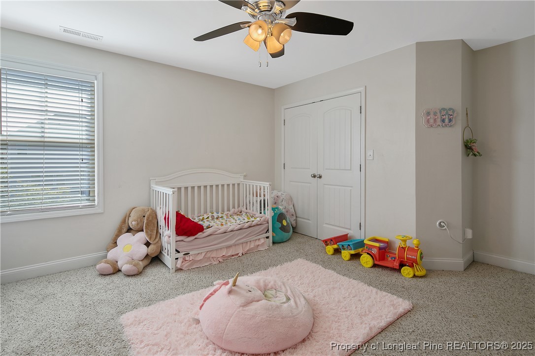 688 Stonebriar Avenue Raeford, NC 28376 - Photo 43 of 50 a bedroom with a bed and a window
