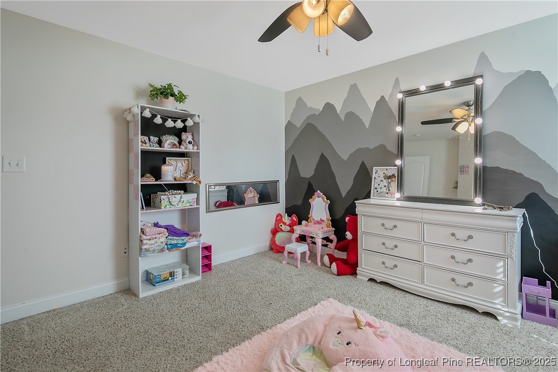 688 Stonebriar Avenue Raeford, NC 28376 - Photo 45 of 50 a bedroom with a bed and a dresser