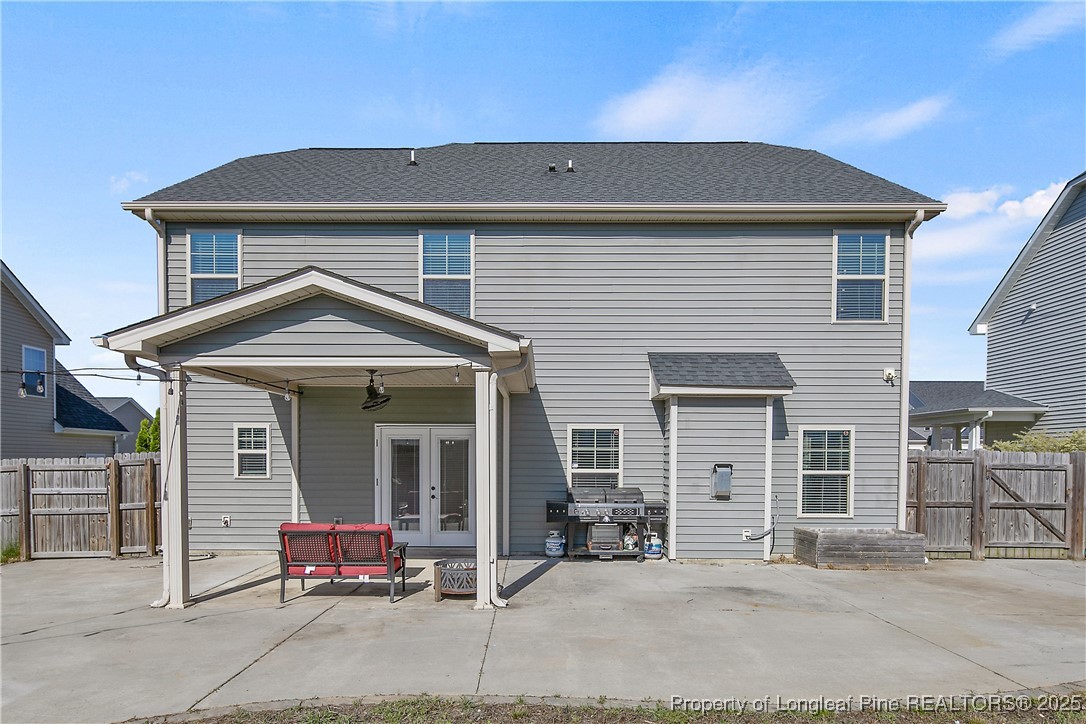 688 Stonebriar Avenue Raeford, NC 28376 - Photo 46 of 50 a front view of a house with a garage and chair