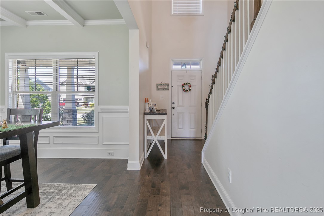 688 Stonebriar Avenue Raeford, NC 28376 - Photo 6 of 50 a view of entryway with furniture and wooden floor