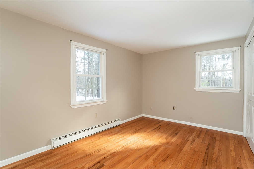 246 Bumstead Road Monson, MA 01057 - Photo 27 of 32 a view of a room with wooden floor and windows
