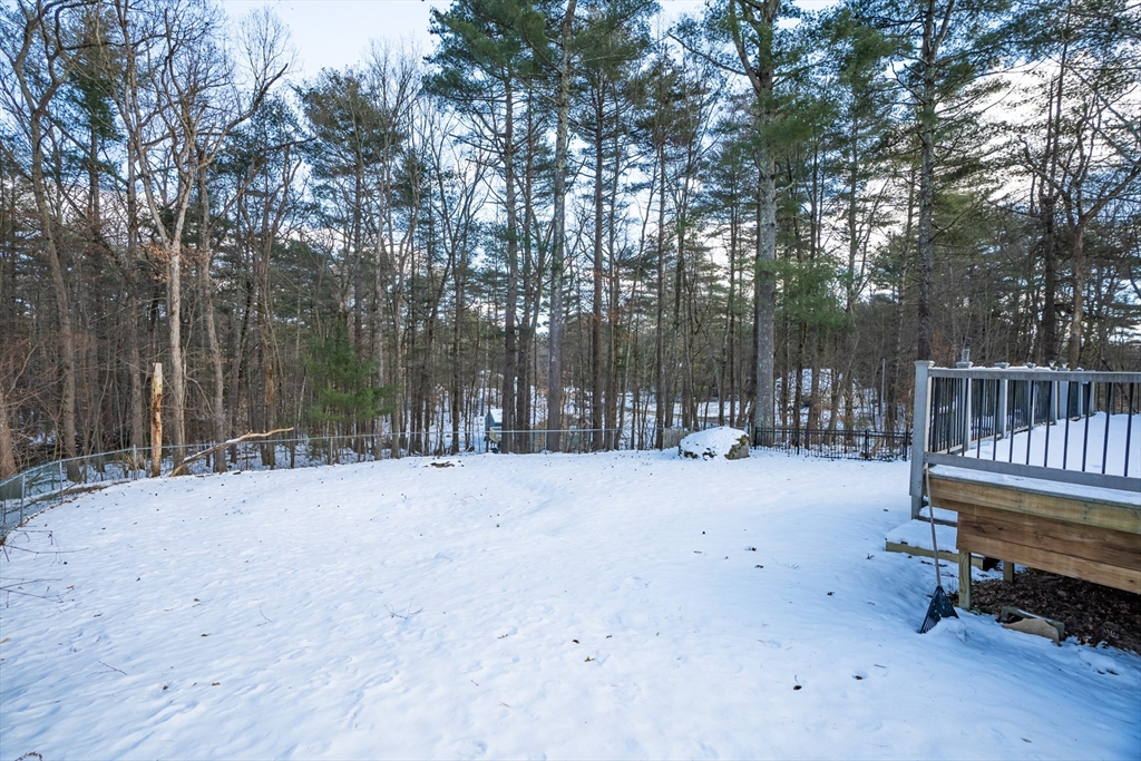 246 Bumstead Road Monson, MA 01057 - Photo 7 of 32 a wooden bench sitting in the middle of a yard
