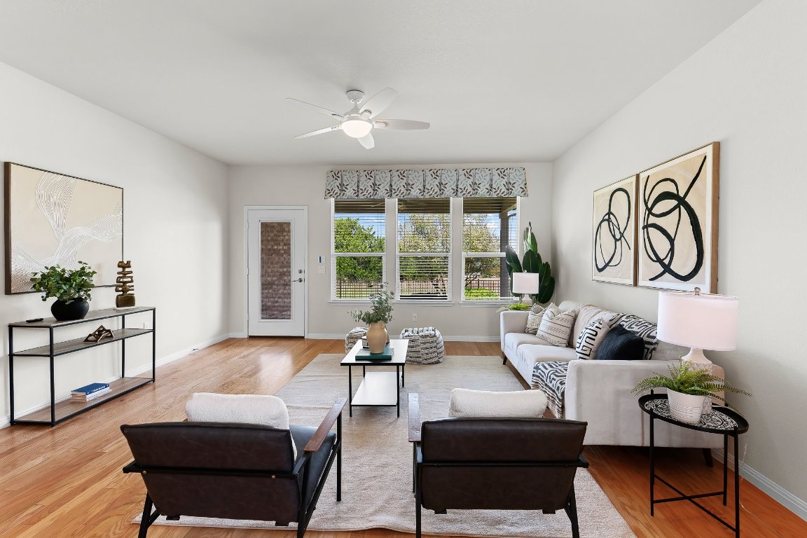 608 Kite Ridge Street Georgetown, TX 78633 - Photo 12 of 39 a living room with furniture and a large window