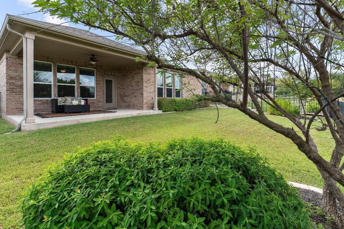 608 Kite Ridge Street Georgetown, TX 78633 - Photo 2 of 39 a view of a house with a yard and sitting area