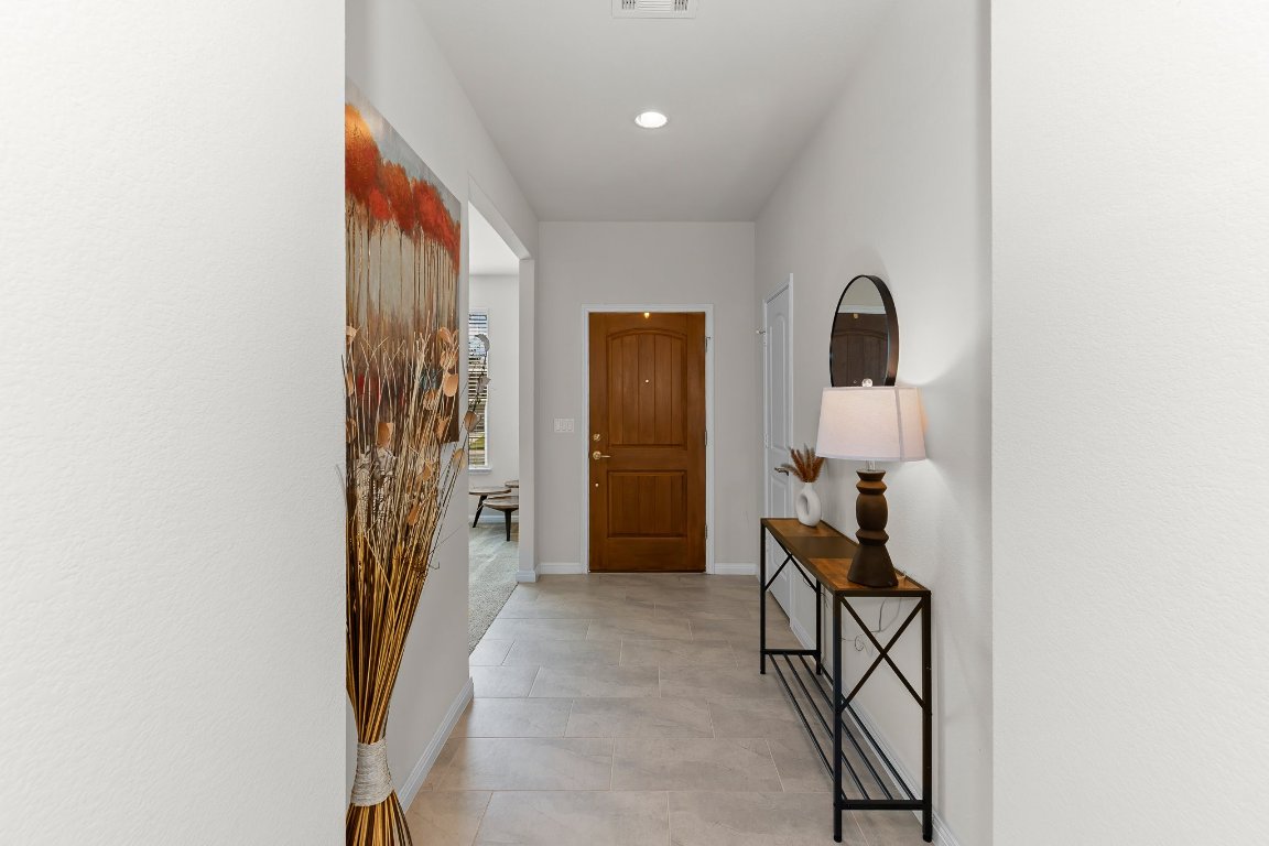 608 Kite Ridge Street Georgetown, TX 78633 - Photo 6 of 39 a view of a livingroom with furniture and front door