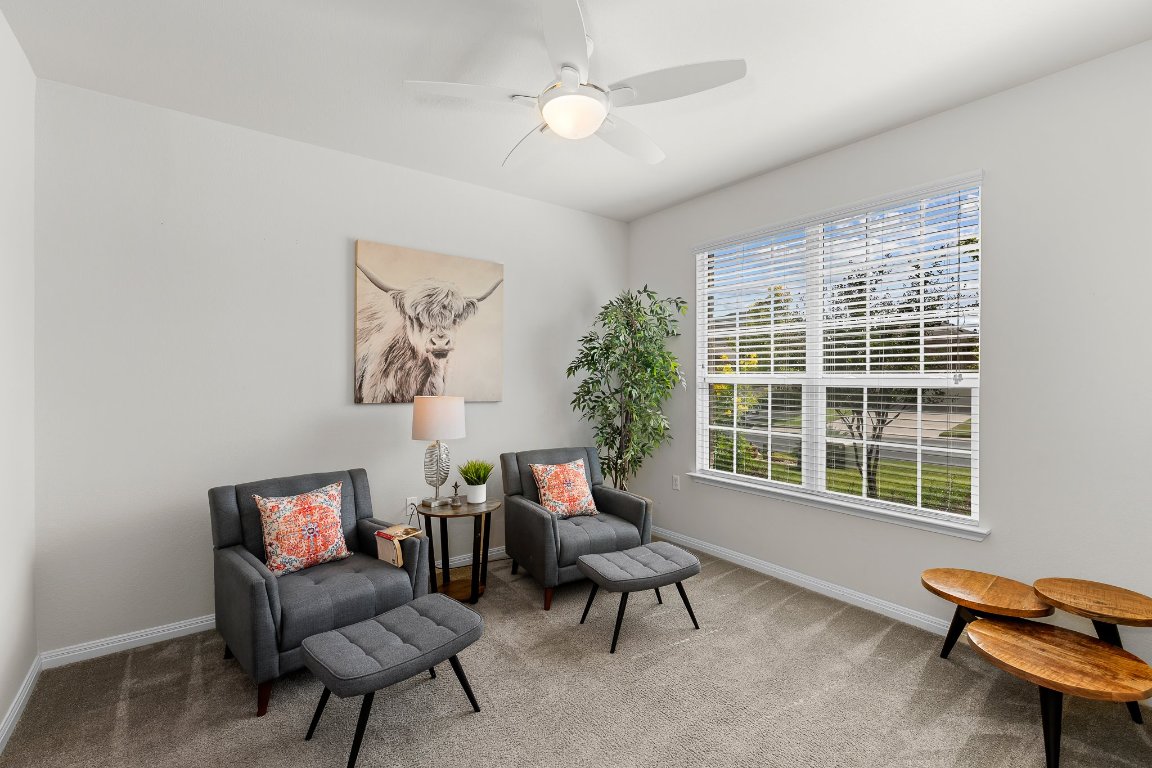 608 Kite Ridge Street Georgetown, TX 78633 - Photo 8 of 39 a living room with furniture and a window