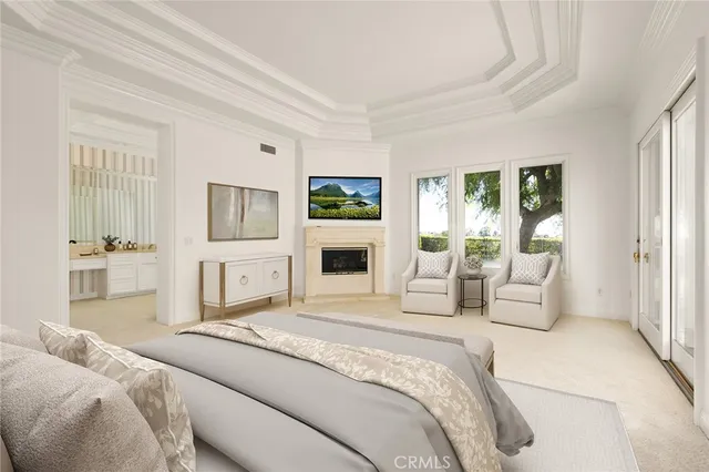 a bedroom with a large bed and furniture