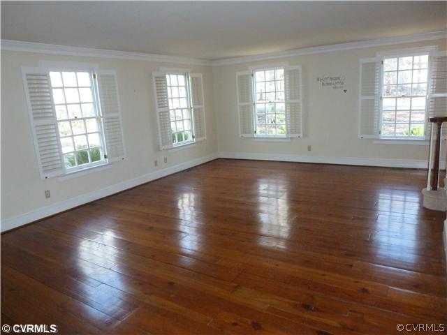 13819 Winterberry Ridge Midlothian, VA 23112 - Photo 8 of 24 an empty room with wooden floor and windows