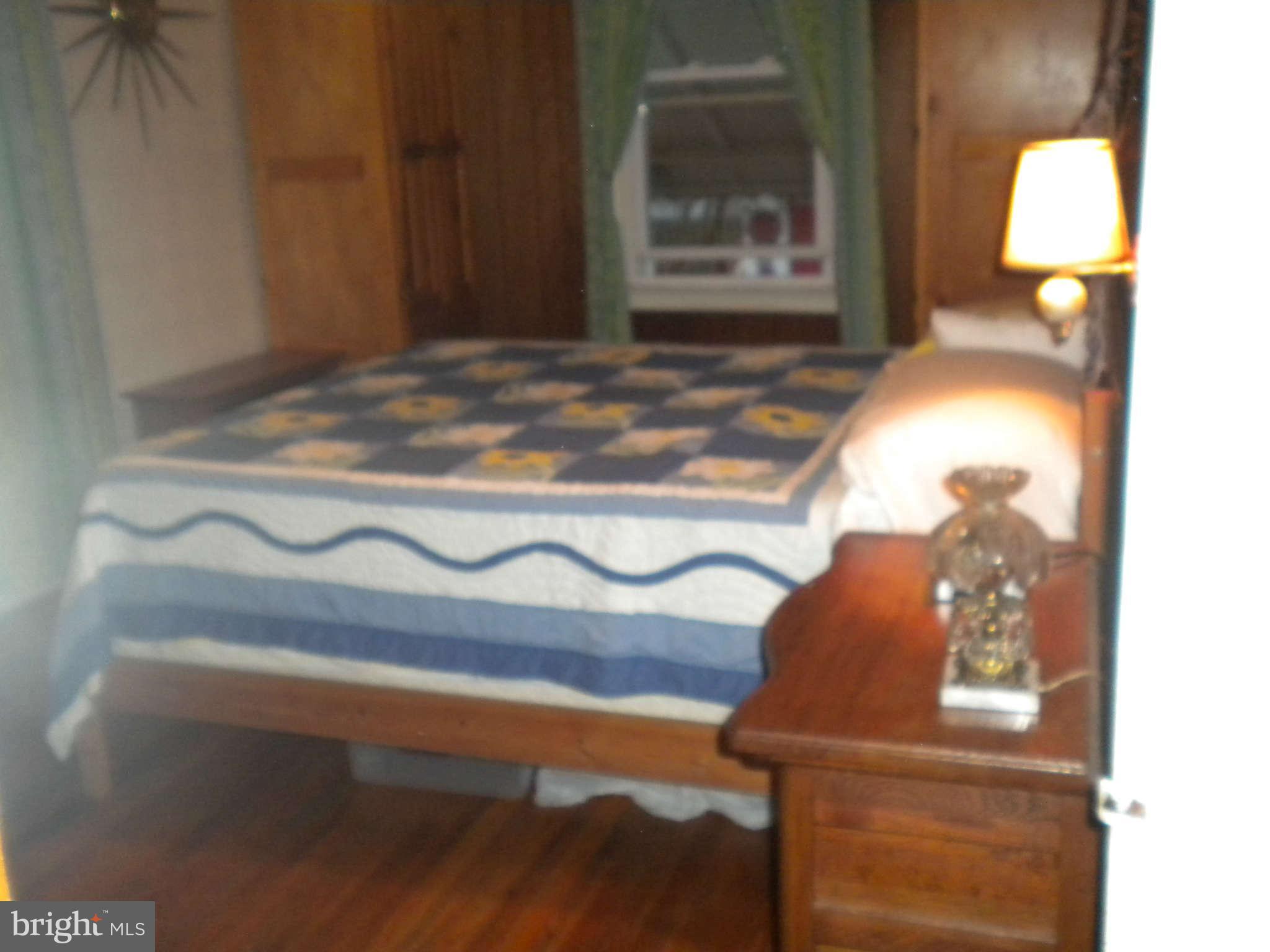 7614 Spruce Road Baltimore, MD 21222 - Photo 27 of 30 a room with a wooden floor